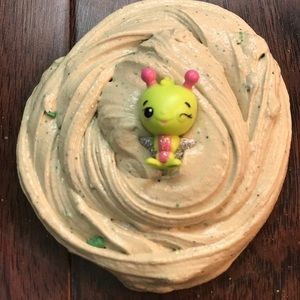 Green stretchy slime with multi-colored glitter.